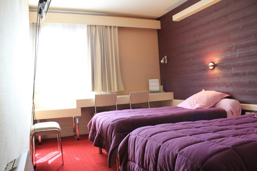 Le France Hotel ลูดิแอค ห้อง รูปภาพ